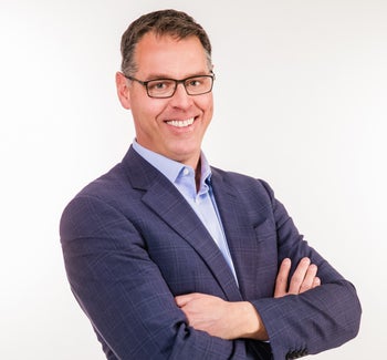 Portrait of Greg Sylvestre, Associate.